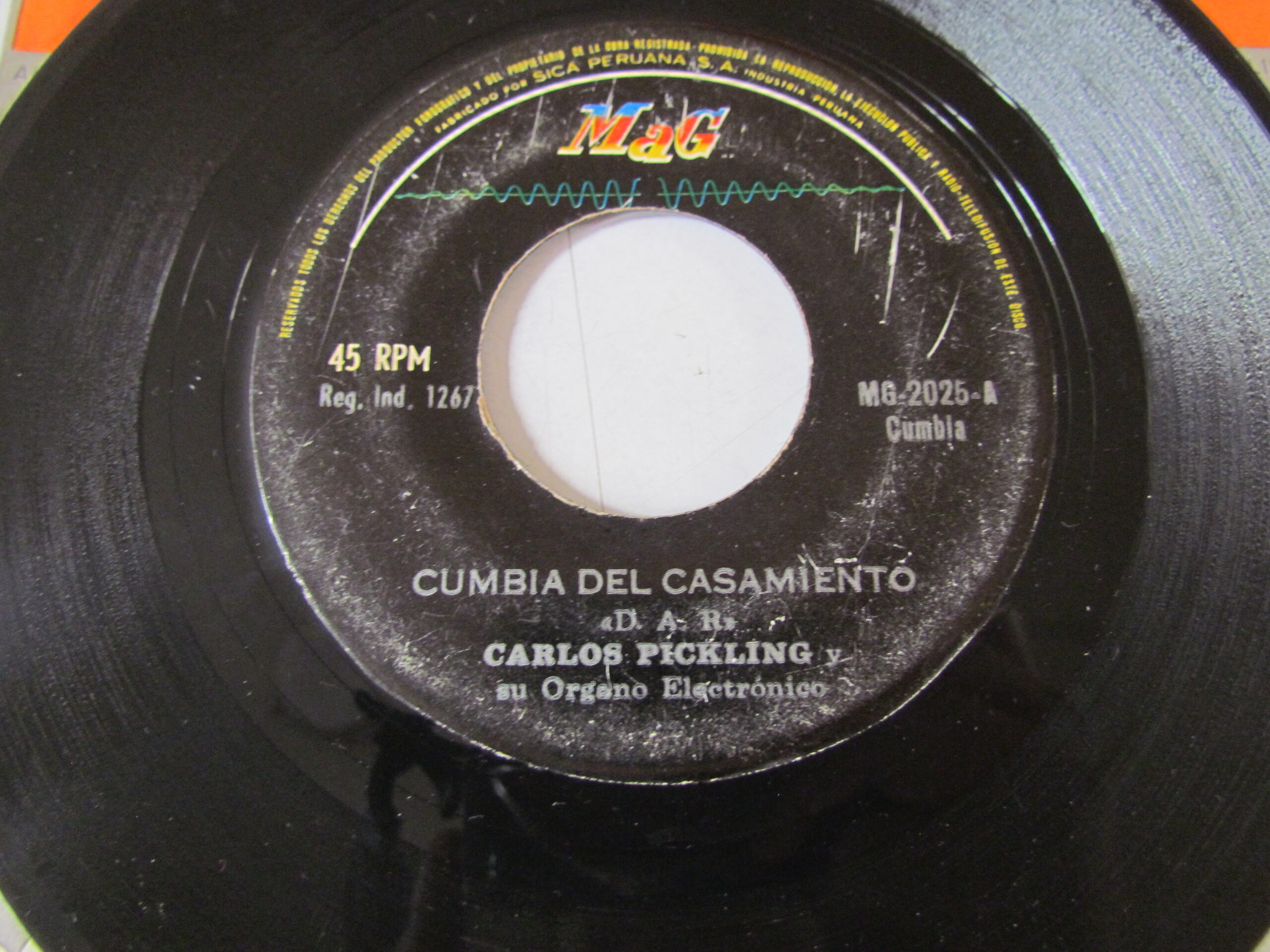CARLOS PICKLING Y SU ORGANO ELECTRONICO "CUMBIA DEL CASAMIENTO/CHUPANDO CARAMELO" 7" CUMBIA ORGAN DESCARGA PERU EX HEAR ♫ - Imagen 3